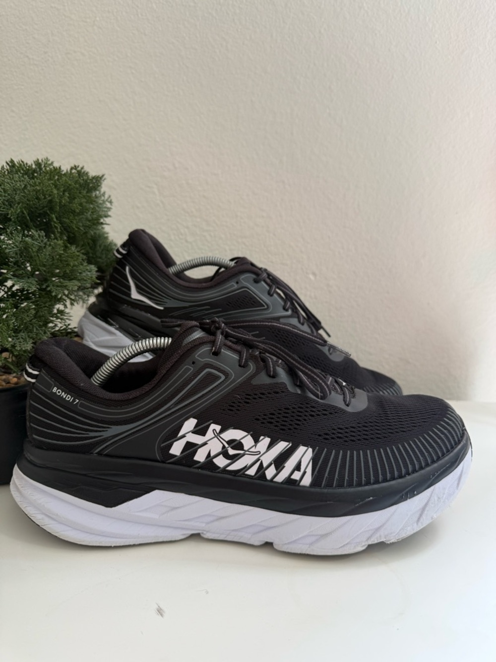 Hoka men size 11.5 Black and White Bondi 7 Cushioned Running Shoes